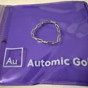 Automic Gold Butch Ring solid 14k white gold 2mm paperclip chain.